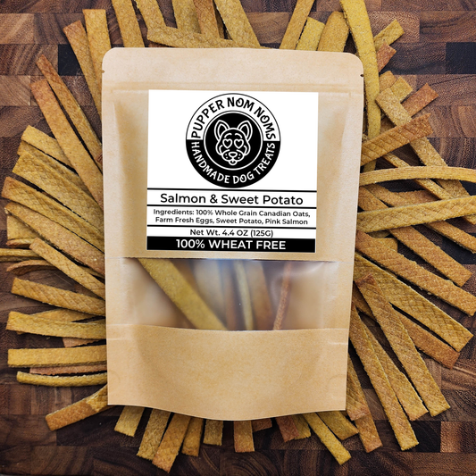 A bag of wheat-free dog treats made with wild salmon and sweet potato – nutritious and flavorful.