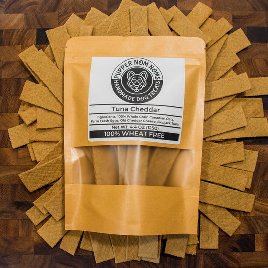 Wheat-free dog treats combining skipjack tuna and aged cheddar for a tasty reward.