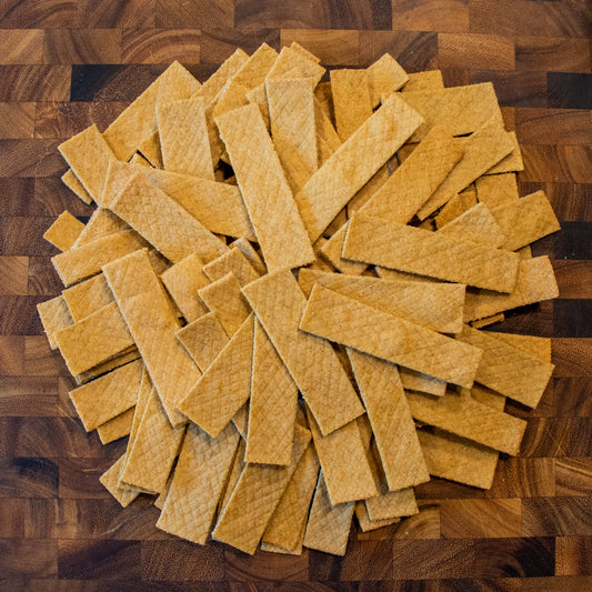 Wheat-free dog treats combining skipjack tuna and aged cheddar for a tasty reward.